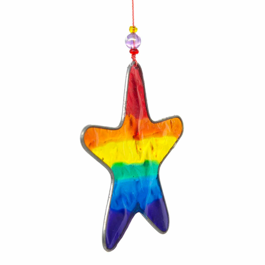 Small star-shaped suncatcher with a bright rainbow stripe running across it, in a soldered metal frame