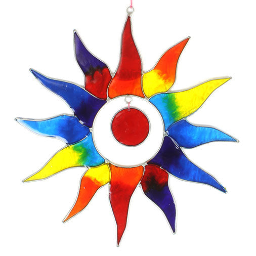 Sun-shaped suncatcher with twelve tapered rays in red, blue, yellow, green, orange and purple resin around a white centre, in a soldered metal frame