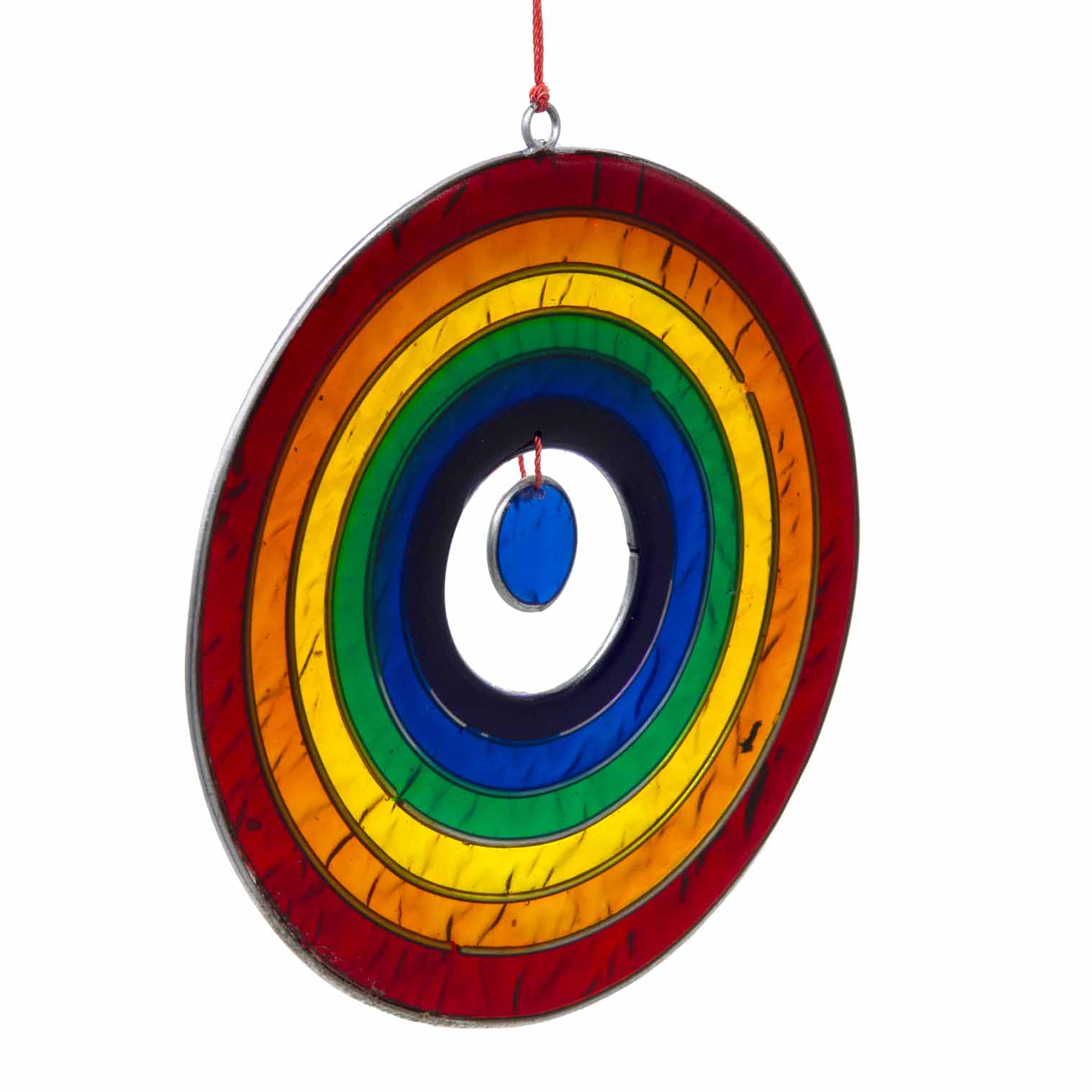 Round suncatcher with concentric rings of rainbow colour radiating from a deep blue centre, in a soldered metal frame