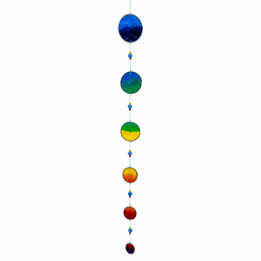 Vertical cascade of six resin discs swirled from deep blue through teal and green to warm orange, with bright glass beads between them