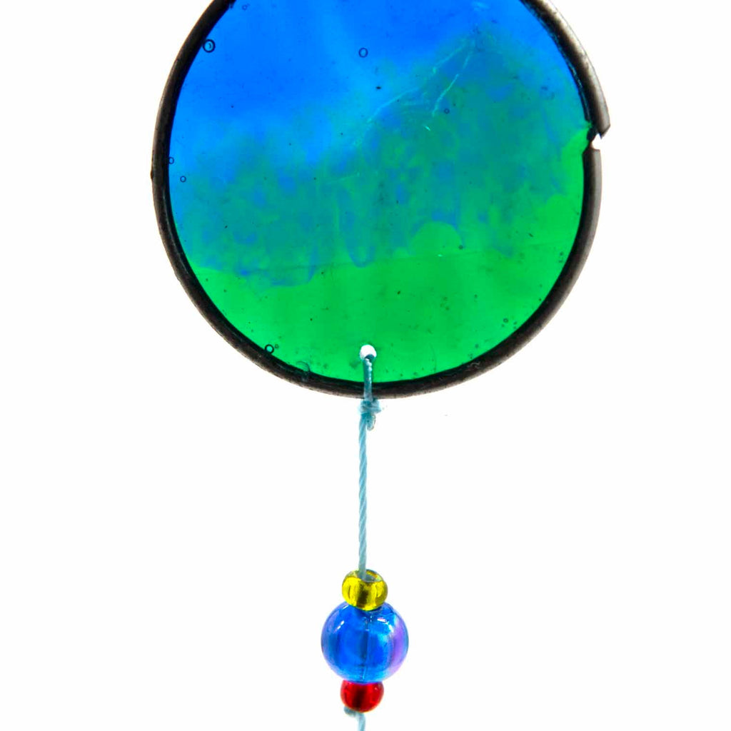 Vertical cascade of six resin discs swirled from deep blue through teal and green to warm orange, with bright glass beads between them