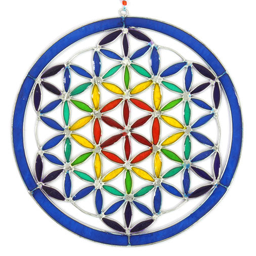 Round Flower of Life suncatcher with an overlapping-circle pattern in full rainbow resin, bordered by a deep blue ring