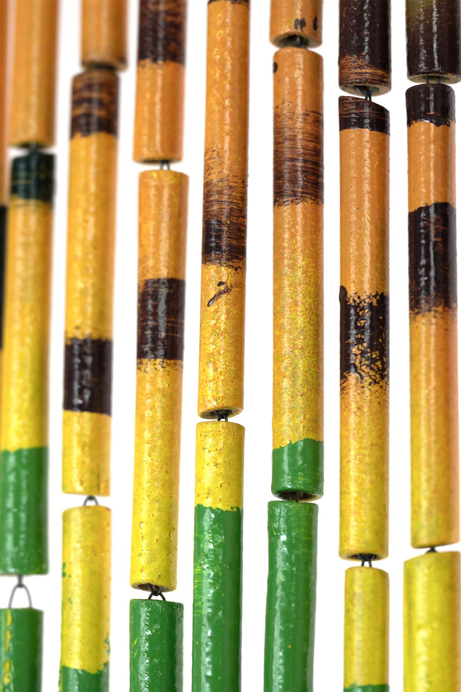 Hand-painted bamboo bead curtain with a bright yellow sunflower design, hanging in a doorway