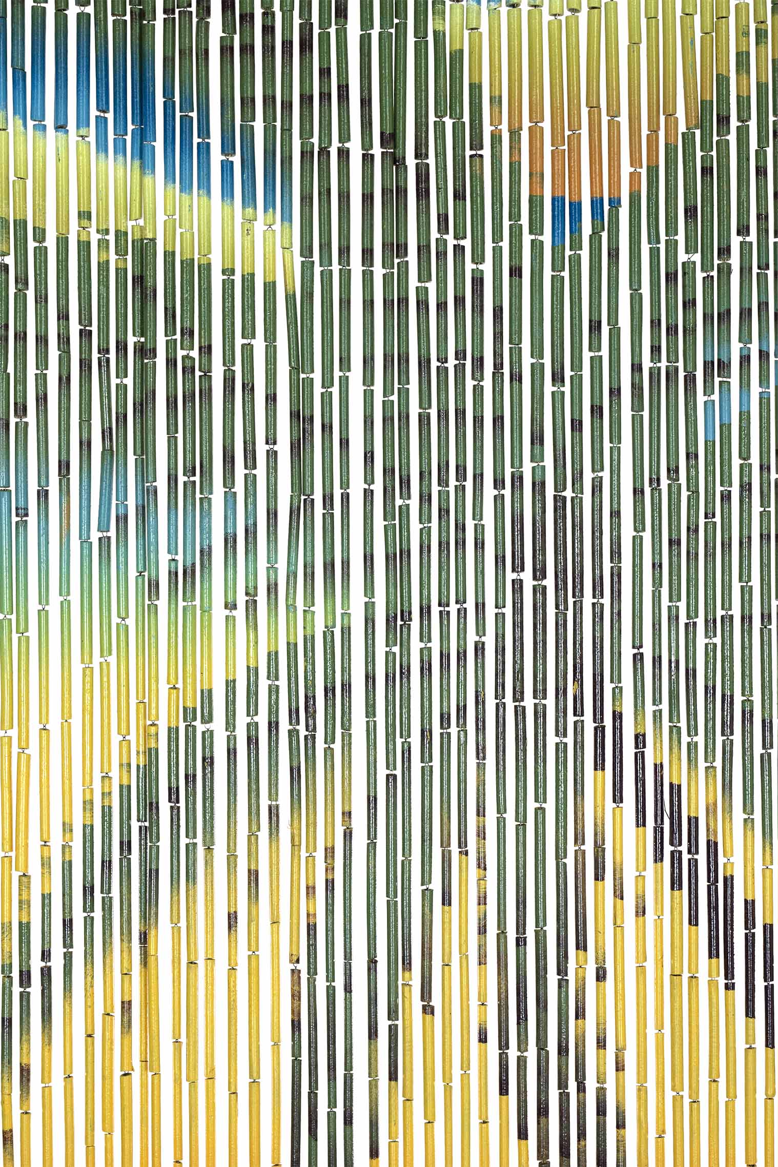 Hand-painted bamboo bead curtain showing a tropical sunset with palm tree silhouettes, hanging in a doorway