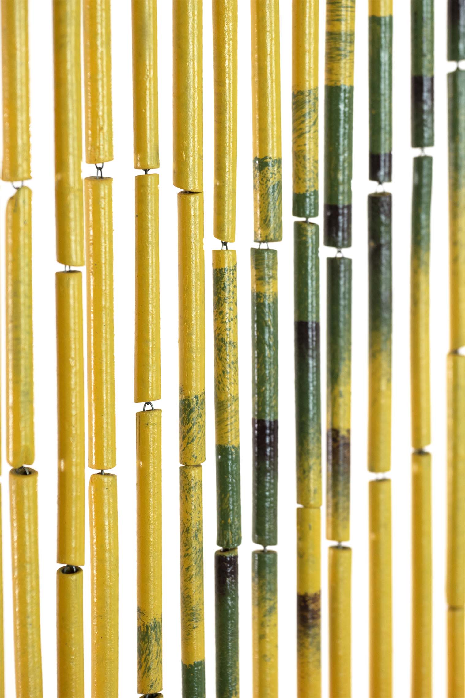 Hand-painted bamboo bead curtain showing a tropical sunset with palm tree silhouettes, hanging in a doorway