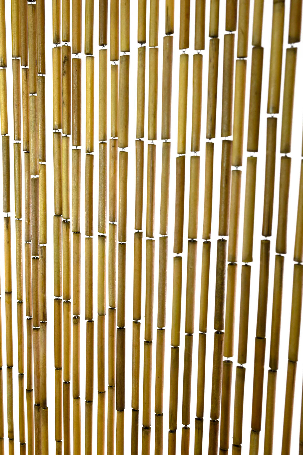 Natural unpainted bamboo bead curtain in warm raw bamboo tones, hanging in a doorway